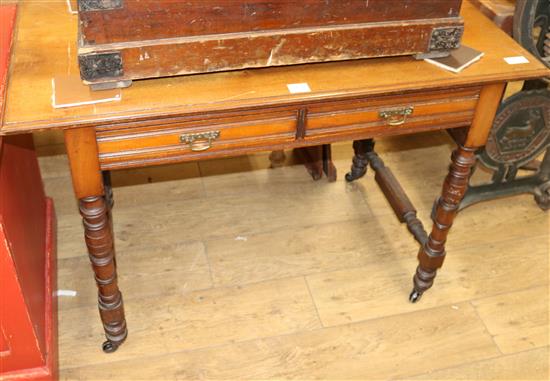 An Edwardian walnut writing table, W.114cm